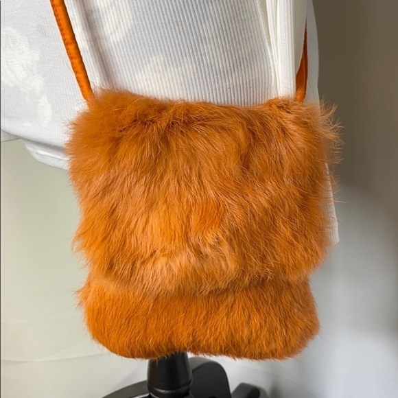 Wilsons Leather Maxima Orange Rabbit Crossbody Bag - Picture 2 of 12